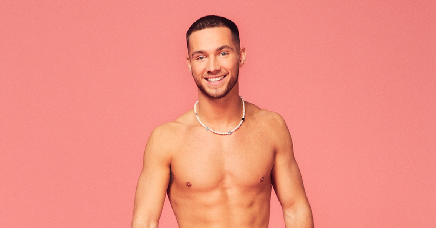 Ron Hall smiling topless in Love Island 2023