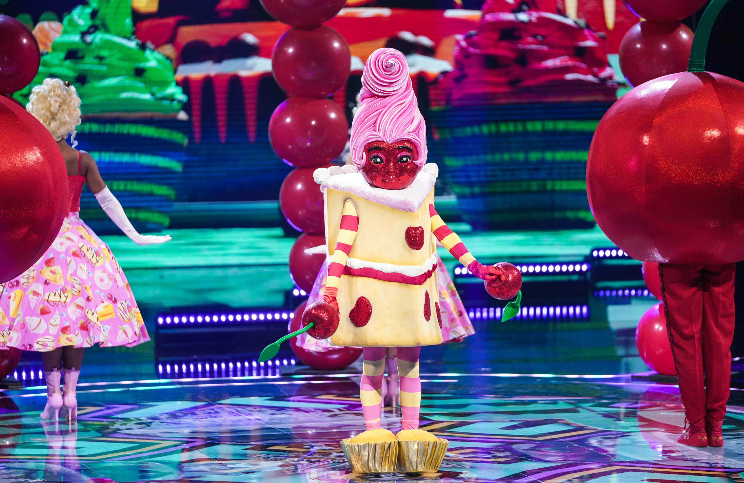 Piece of Cake performing on The Masked Singer UK