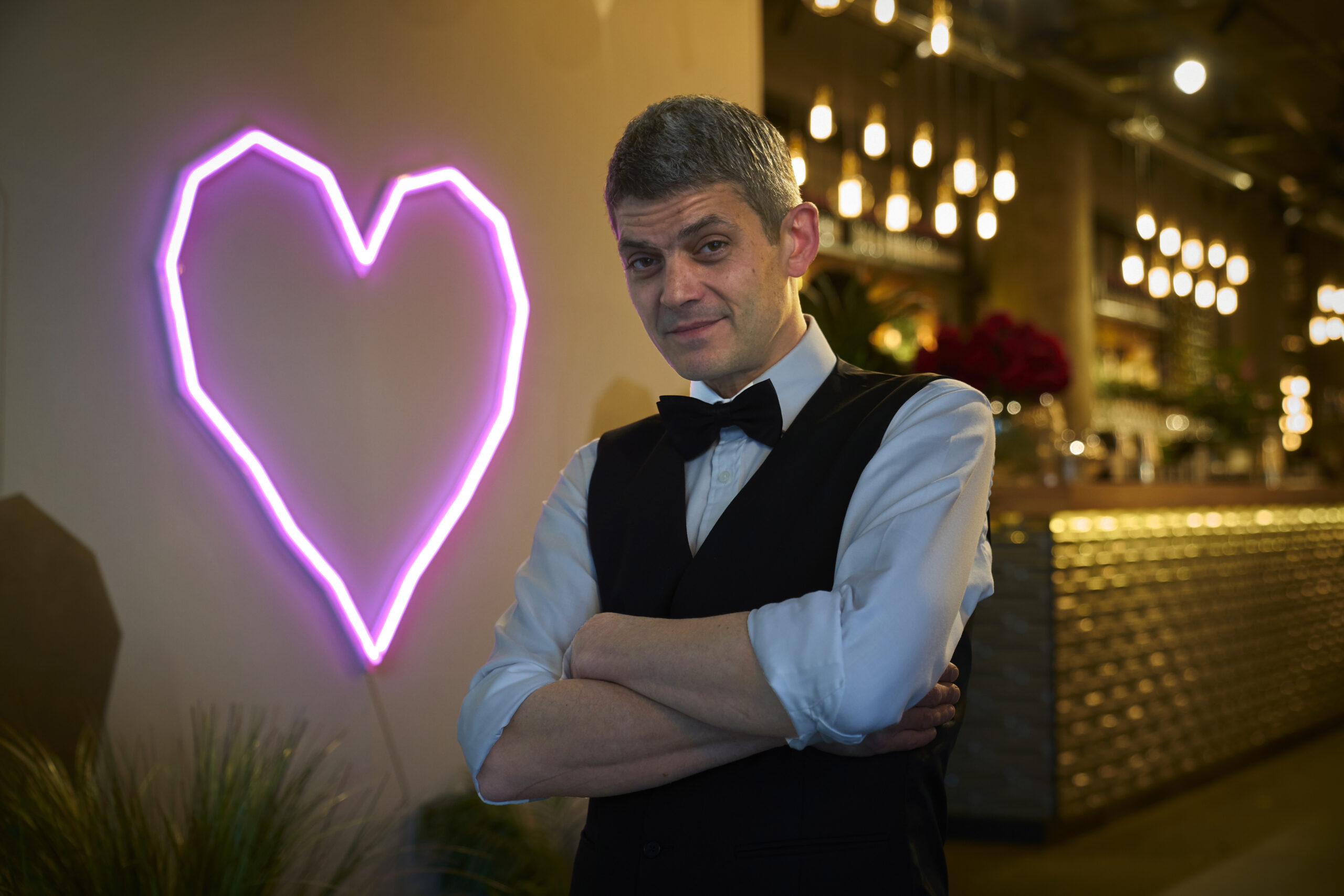 Merlin Griffiths poses in First Dates restaurant