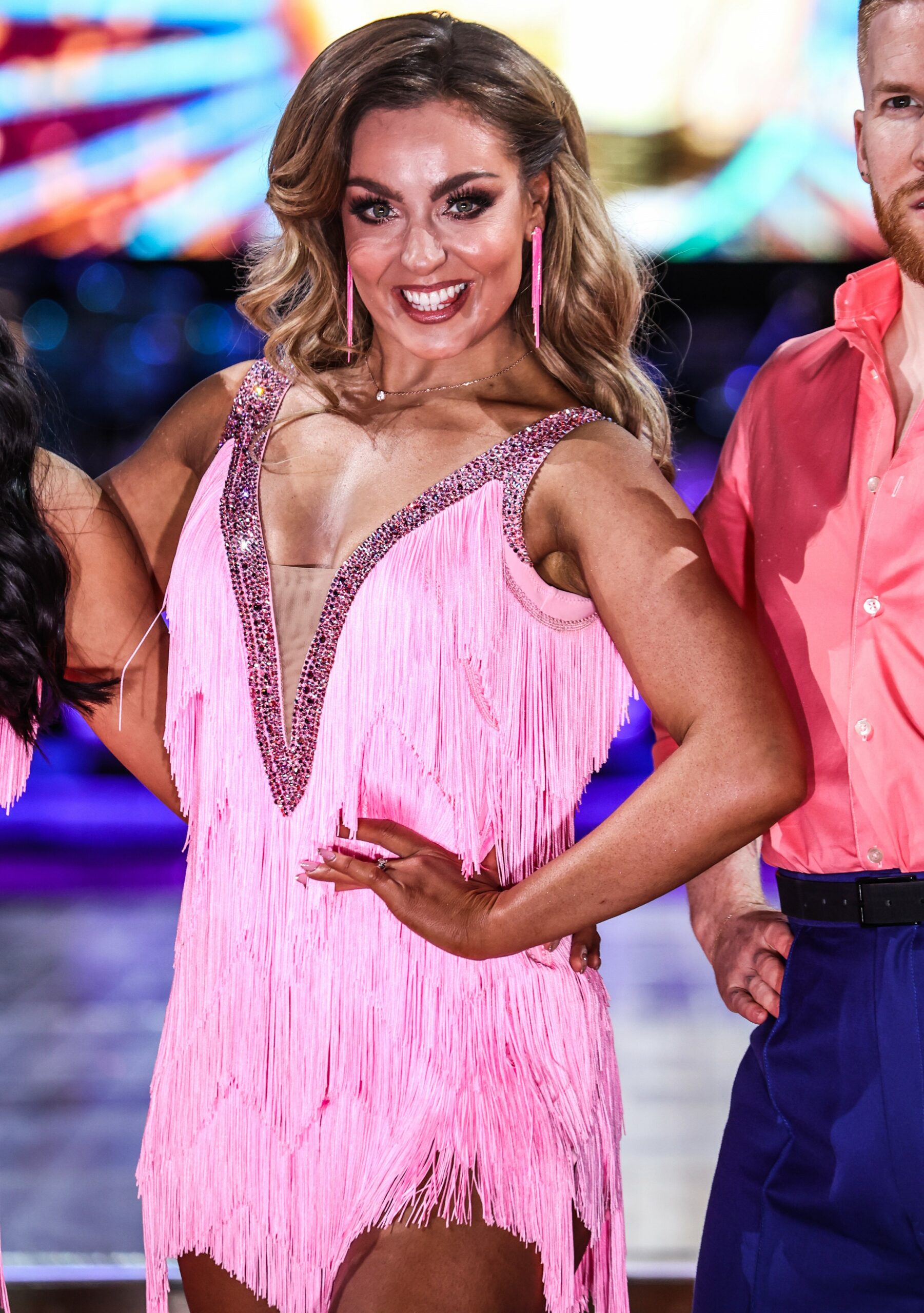 Amy Dowden in pink dress on Strictly tour