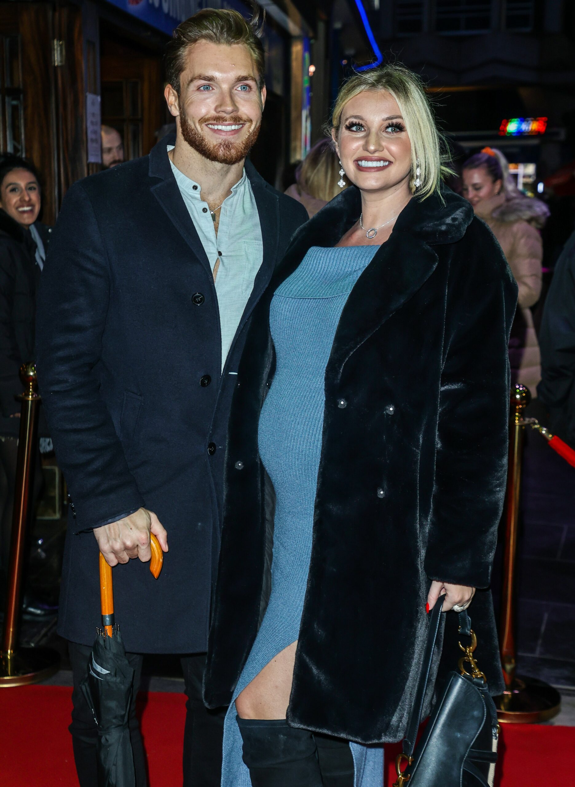 Amy Hart smiling with Sam Rason at event
