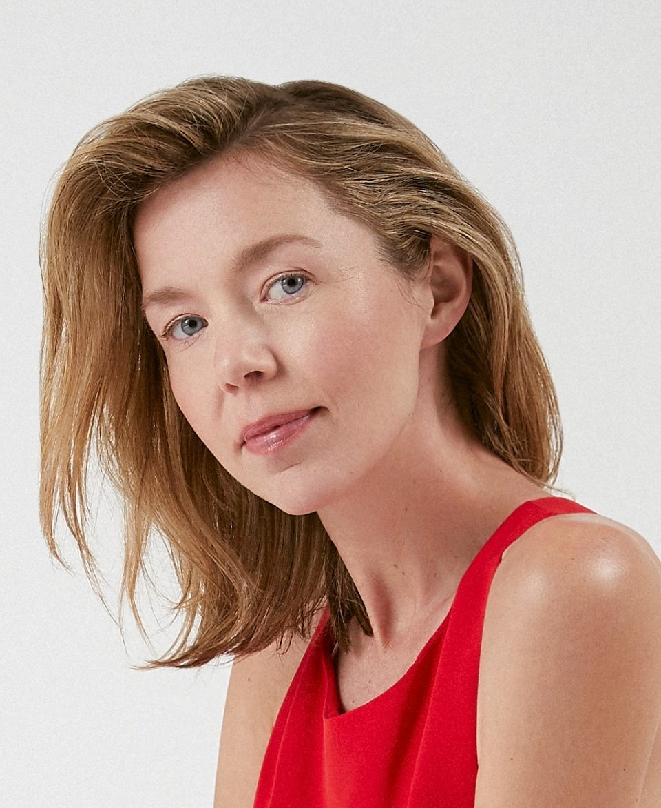 Anna Maxwell Martin smiles in headshot