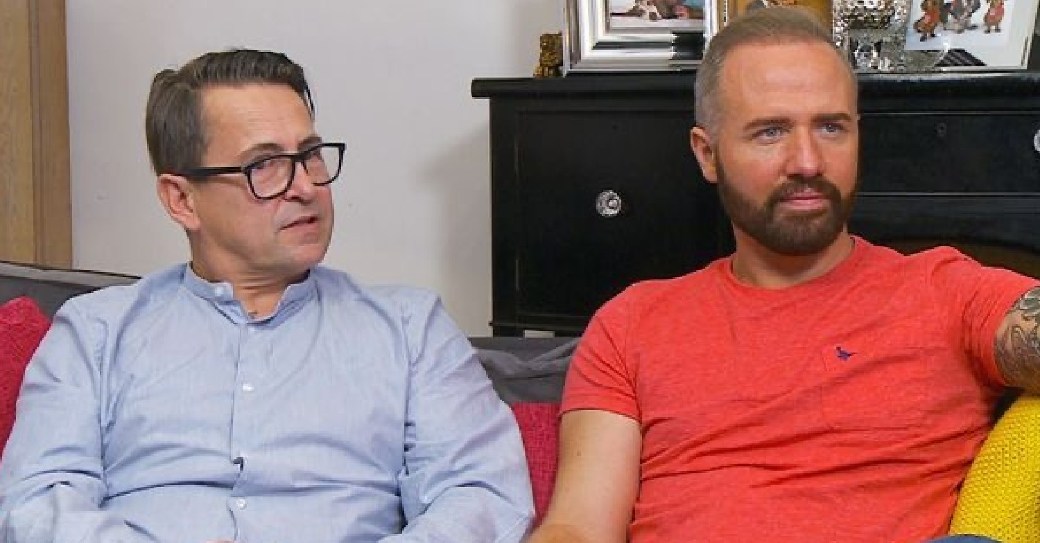 Chris and Stephen sitting on their sofa in Gogglebox