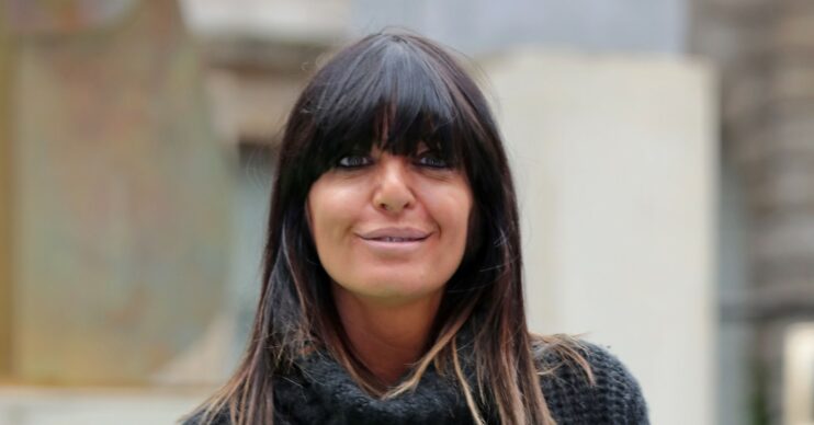 Claudia Winkleman smiles at camera with full fringe