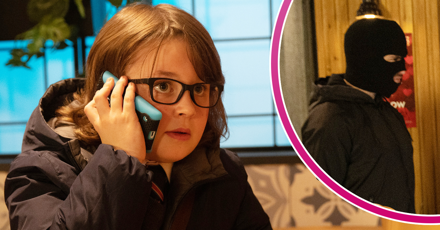 Coronation Street's Sam is on the phone and, in a bubble, is a masked gunman