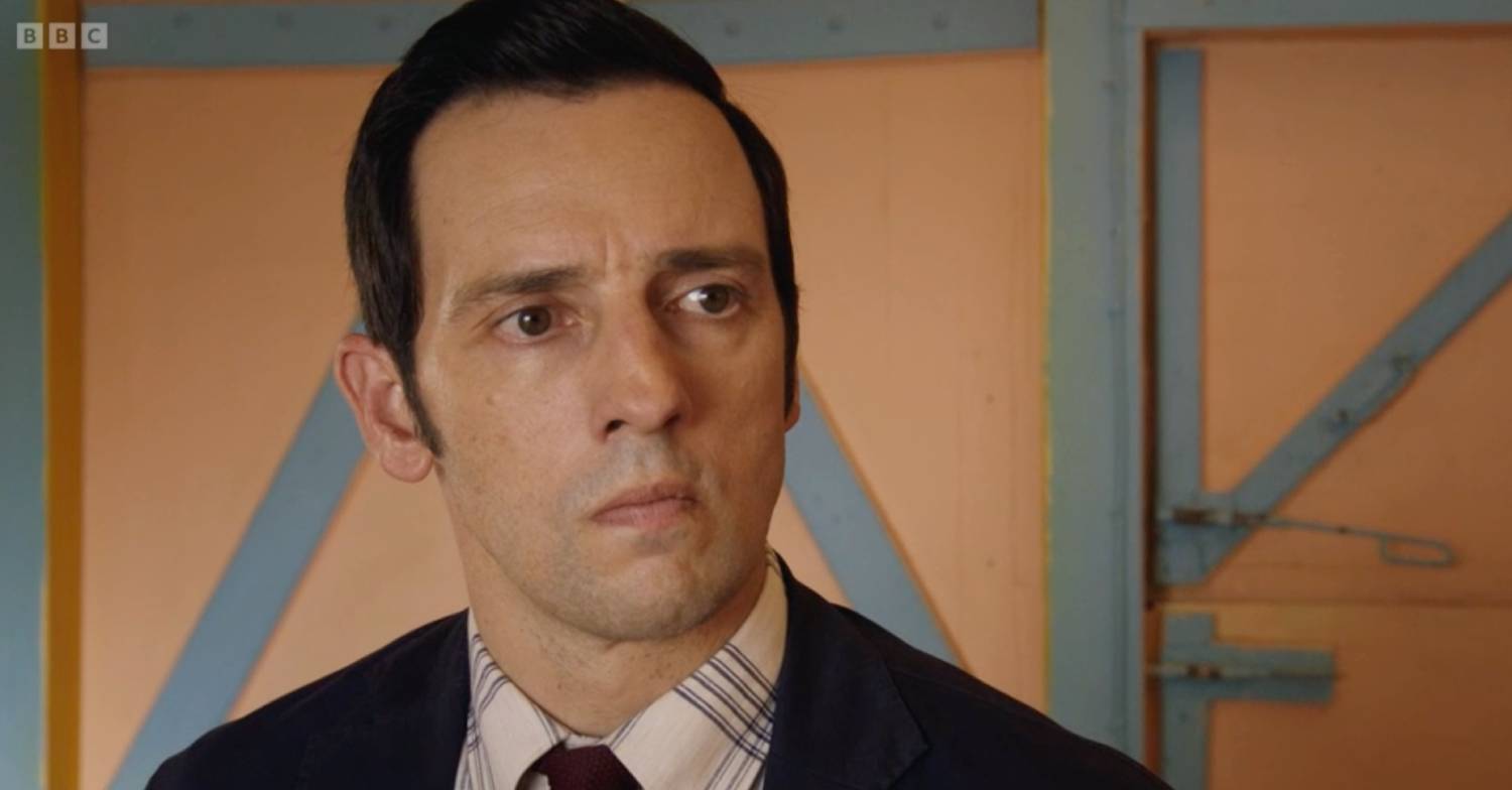 Death In Paradise detective Neville Parker looks furious