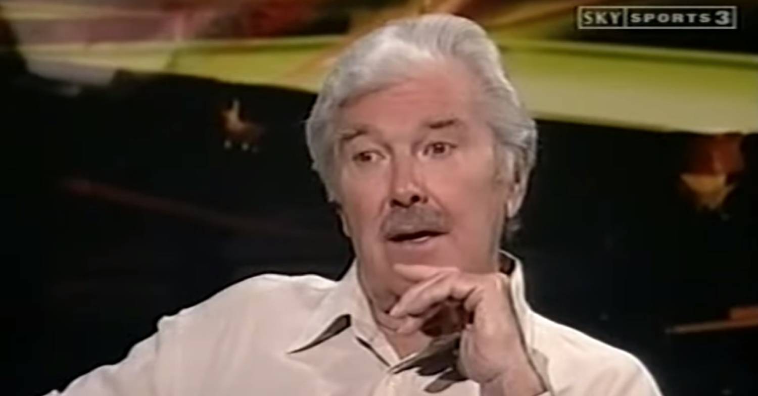 Dickie Davies rests his chin on his hand