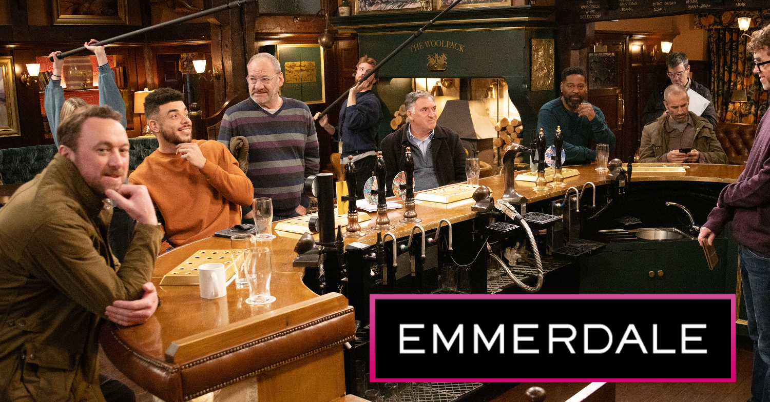 Emmerdale's male characters are gathered around the bar in The Woolpack