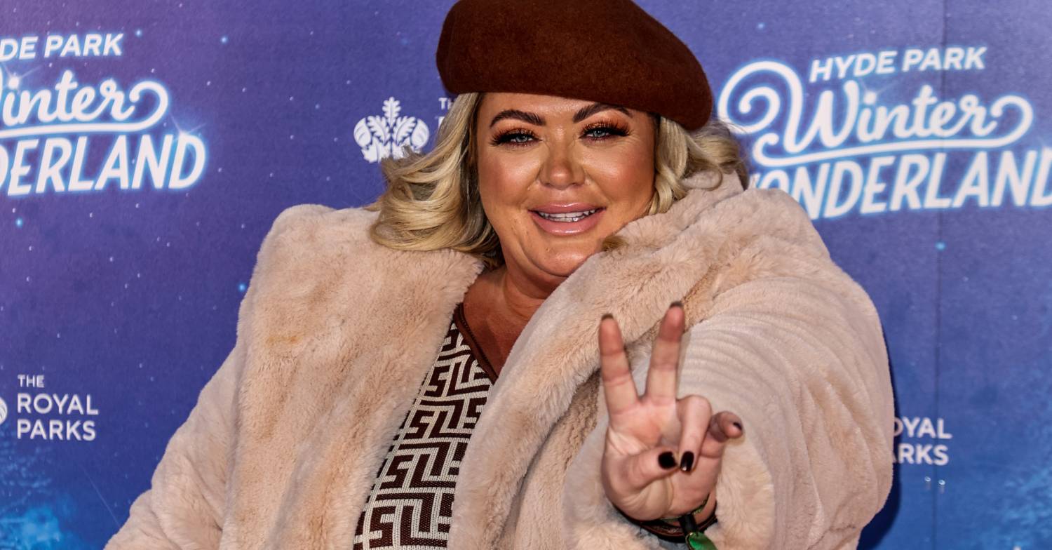 Gemma Collins throws up a peace sign