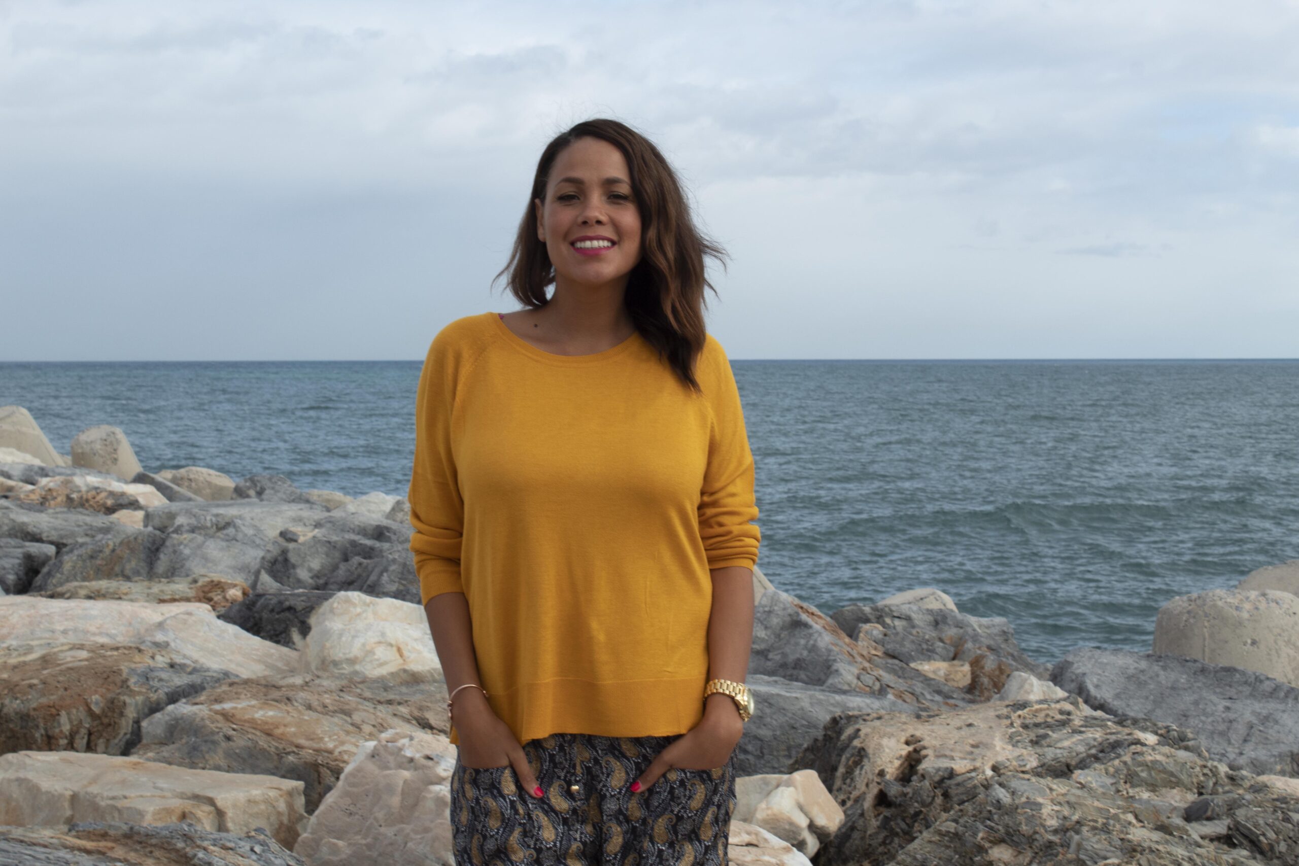 Jean Johansson wearing a yellow jumper in A Place In The Sun