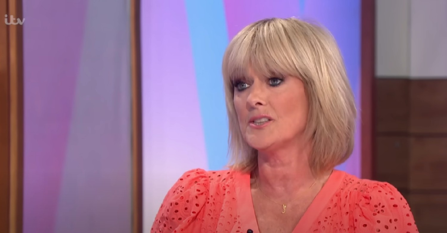 Jane Moore looking serious in peach top on Loose Women