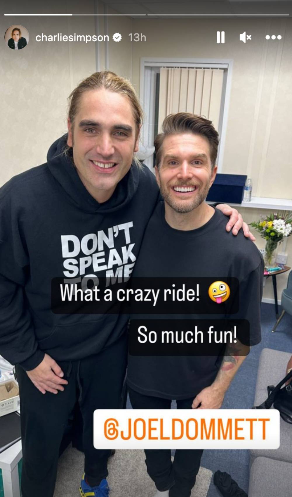 Masked Singer 2023 winner Charlie Simpson poses with Joel Dommett