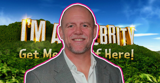 Mike Tindall smiling in front of the I'm A Celebrity logo