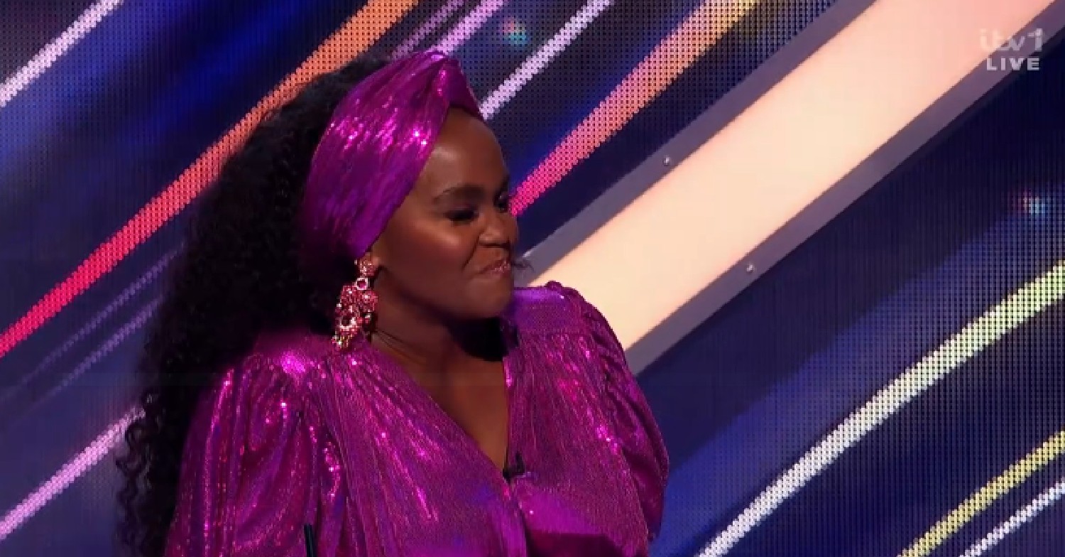 Oti Mabuse in purple outfit on Dancing On Ice tonight