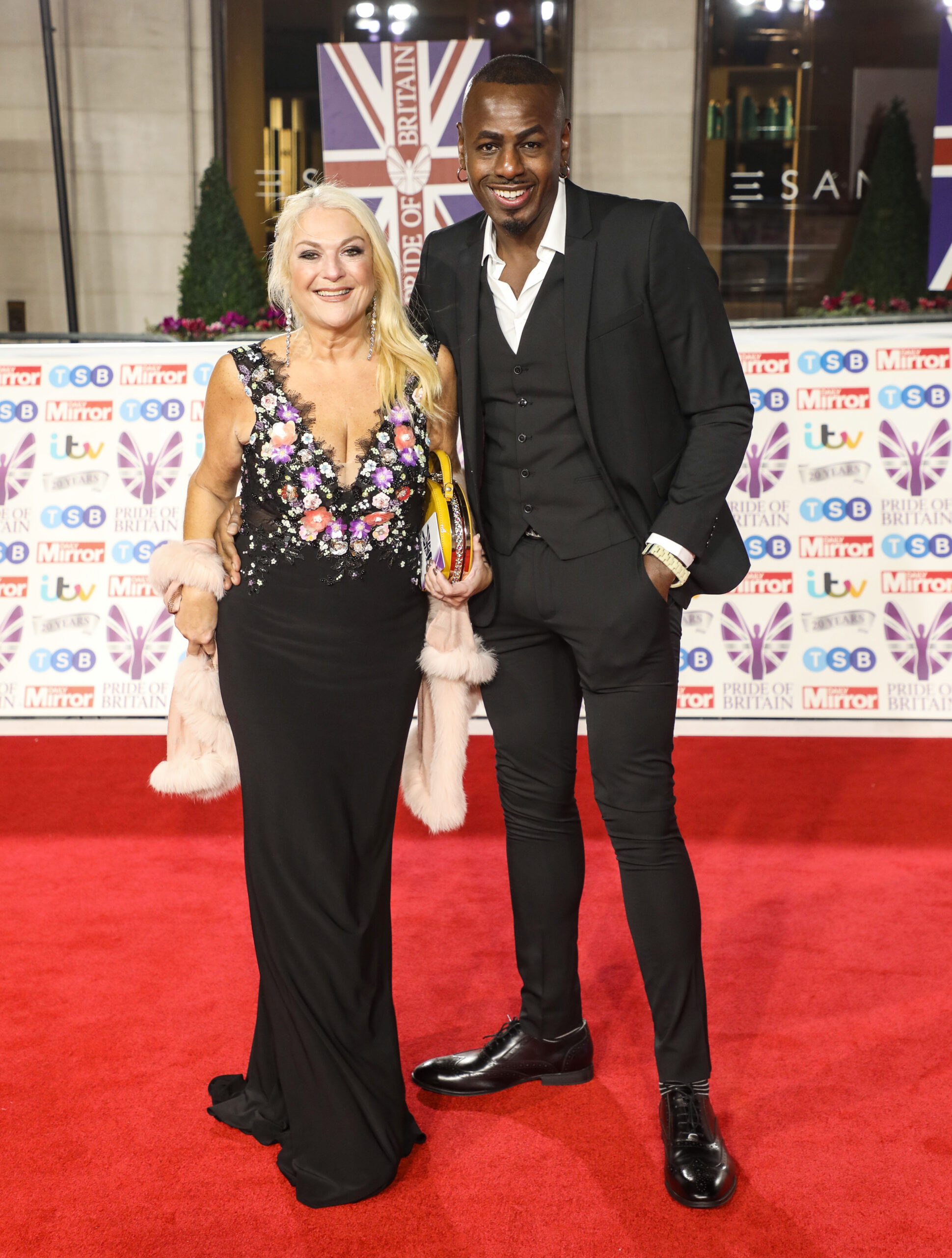 Vanessa Feltz and Ben Ofoedu on the red carpet smiling