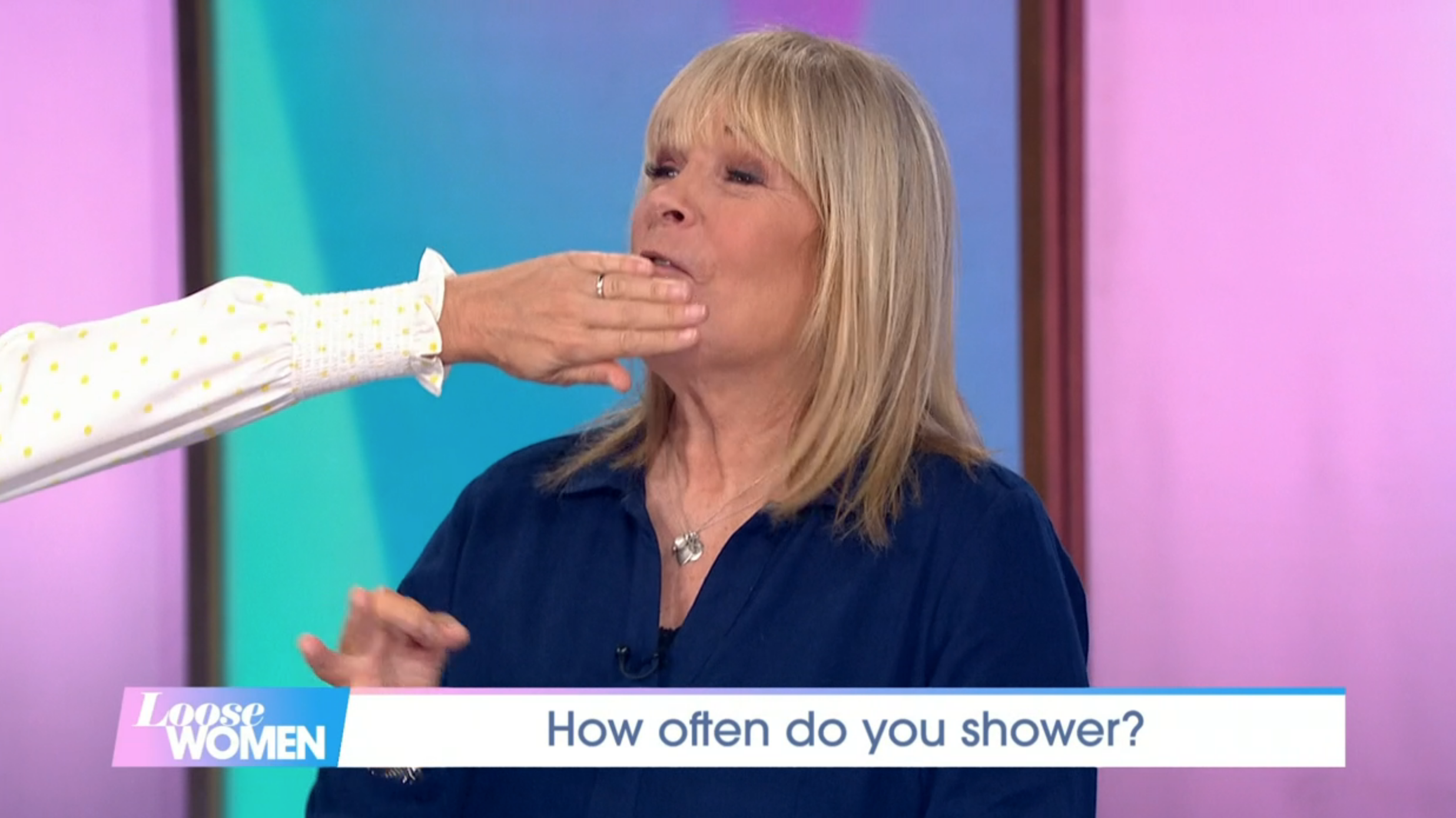 Linda Robson on Loose Women with Jane Moore covering her mouth