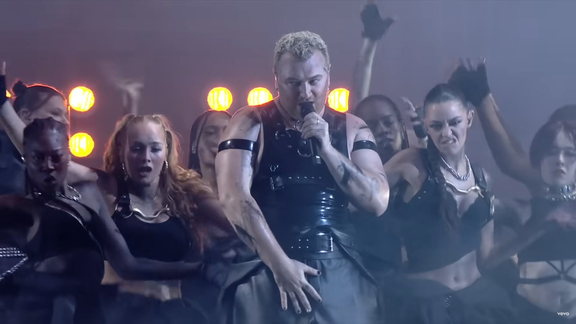 Sam Smith dances on stage during Brit Awards 2023
