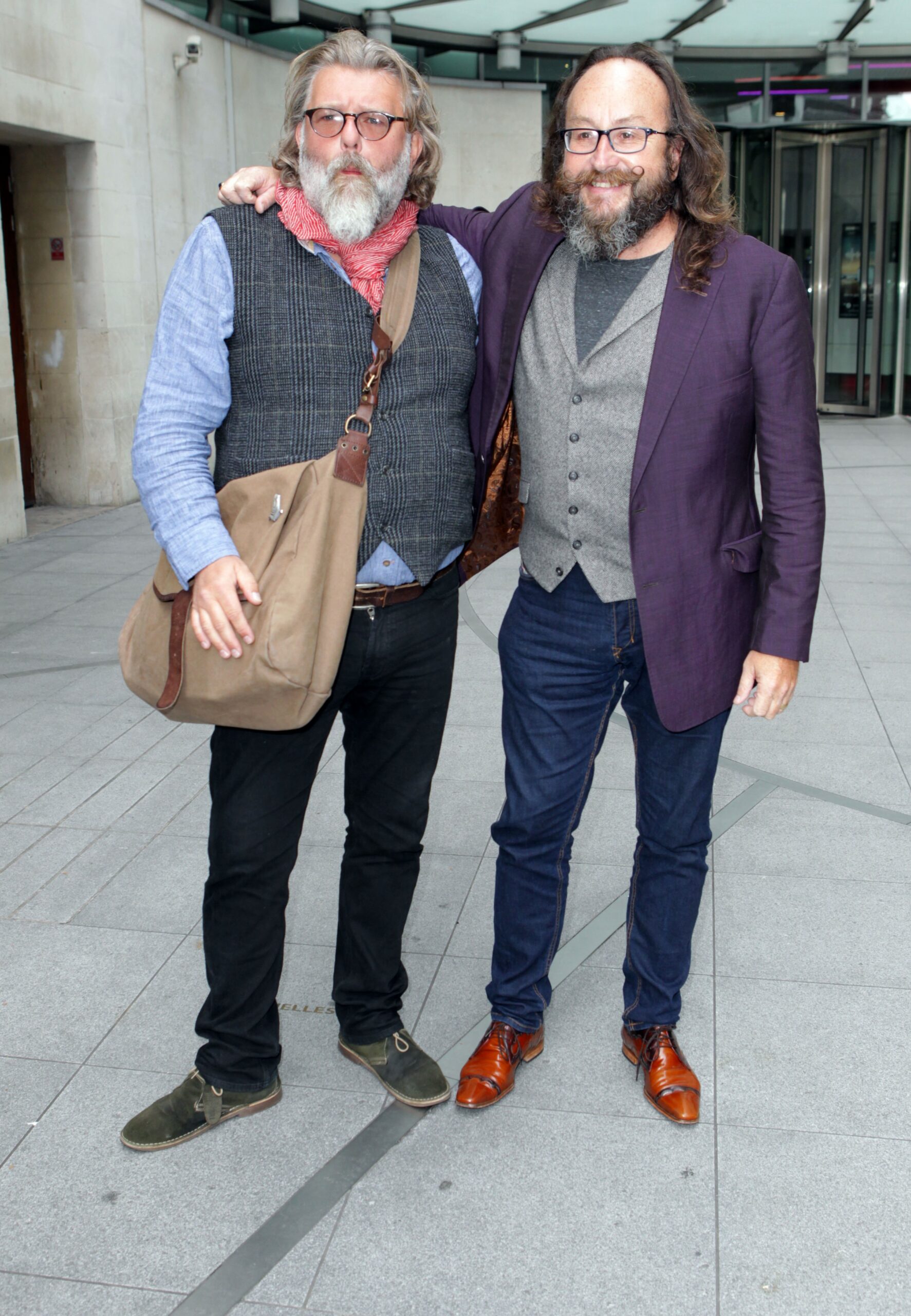 Hairy Bikers Si King and Dave Myers with arms around each other
