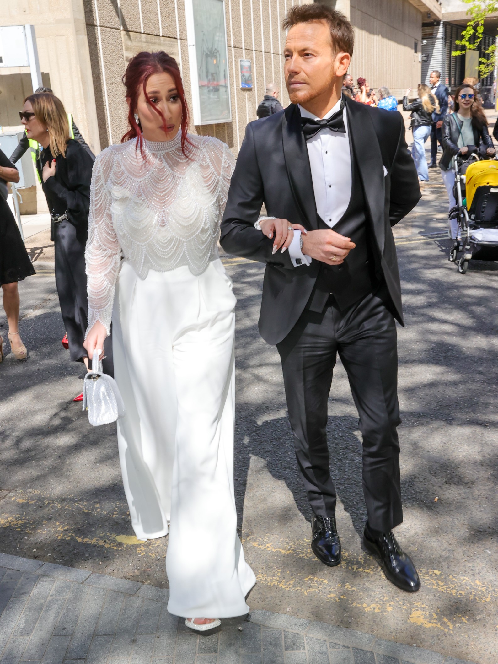 Stacey Solomon and Joe Swash walking arm in arm at BAFTAs