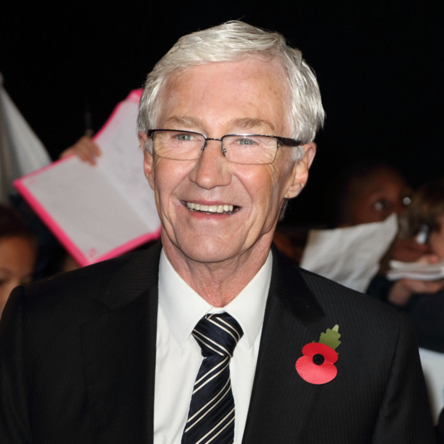Paul O'Grady poses for photos