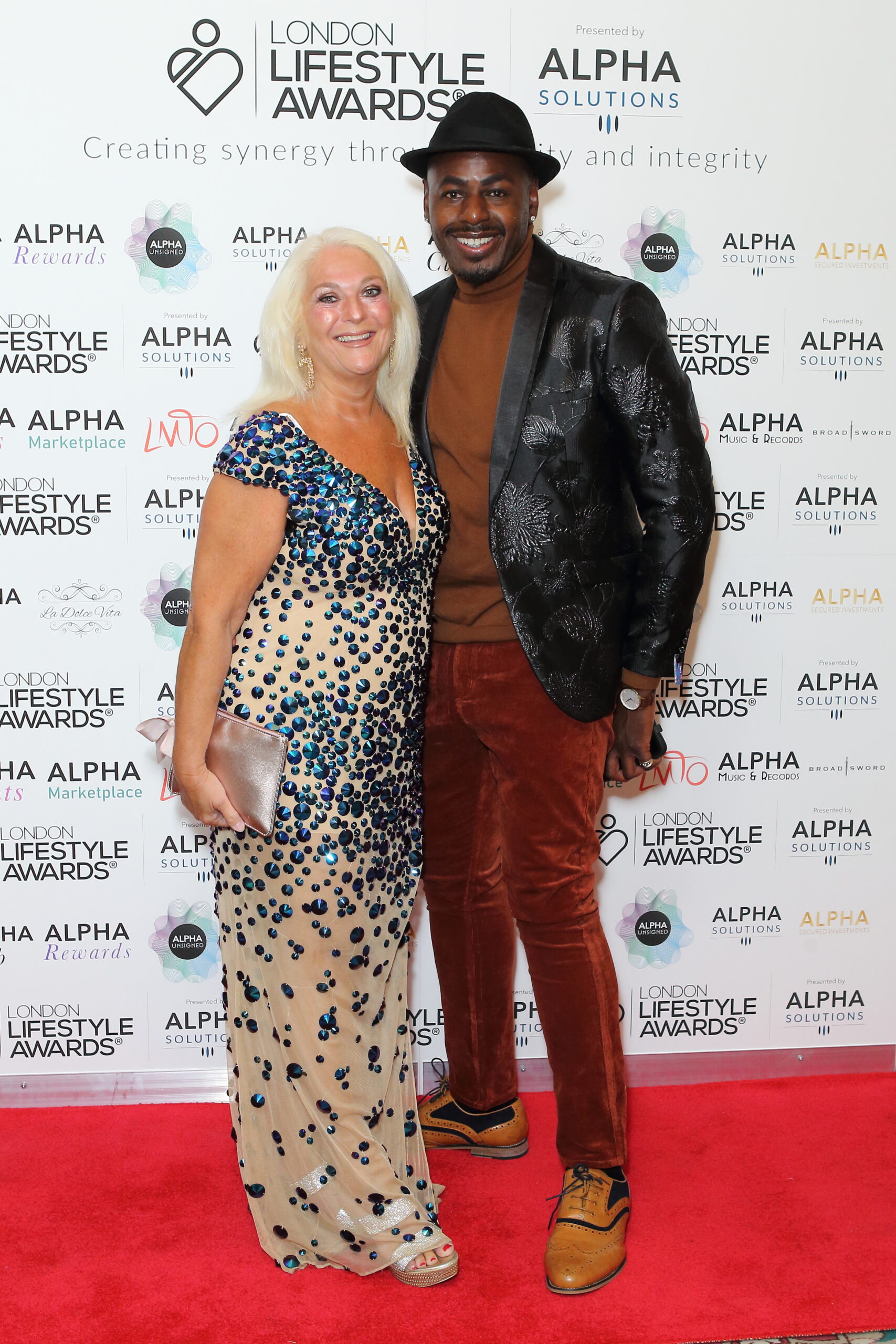 Vanessa Feltz and Ben Ofoedu smiling on the red carpet
