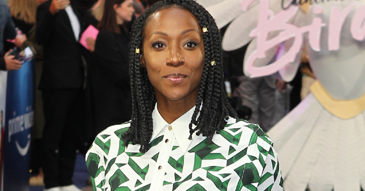 Victoria Ekanoye posing at movie premiere