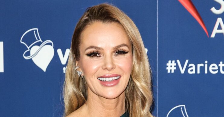 Amanda Holden posing on a red carpet