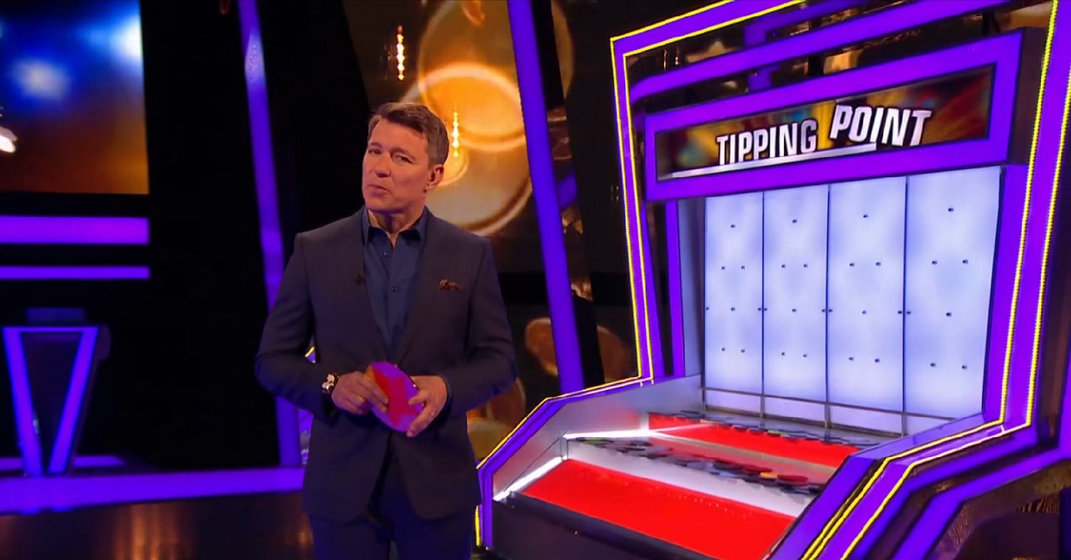 Ben Shephard standing in front of the Tipping Point machine