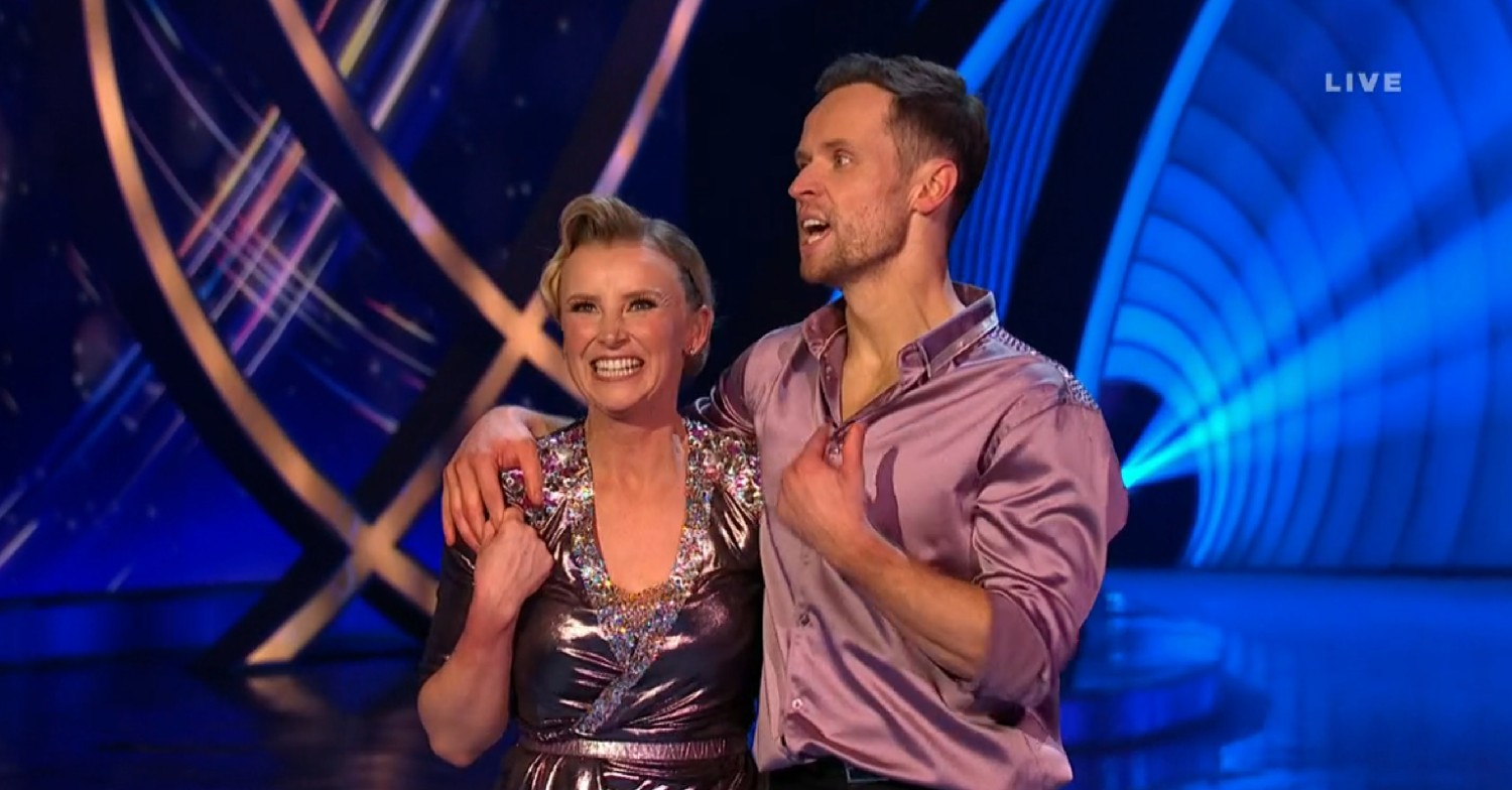 Carley Stenson smiling and Mark Hanretty looking concerned on Dancing On Ice 