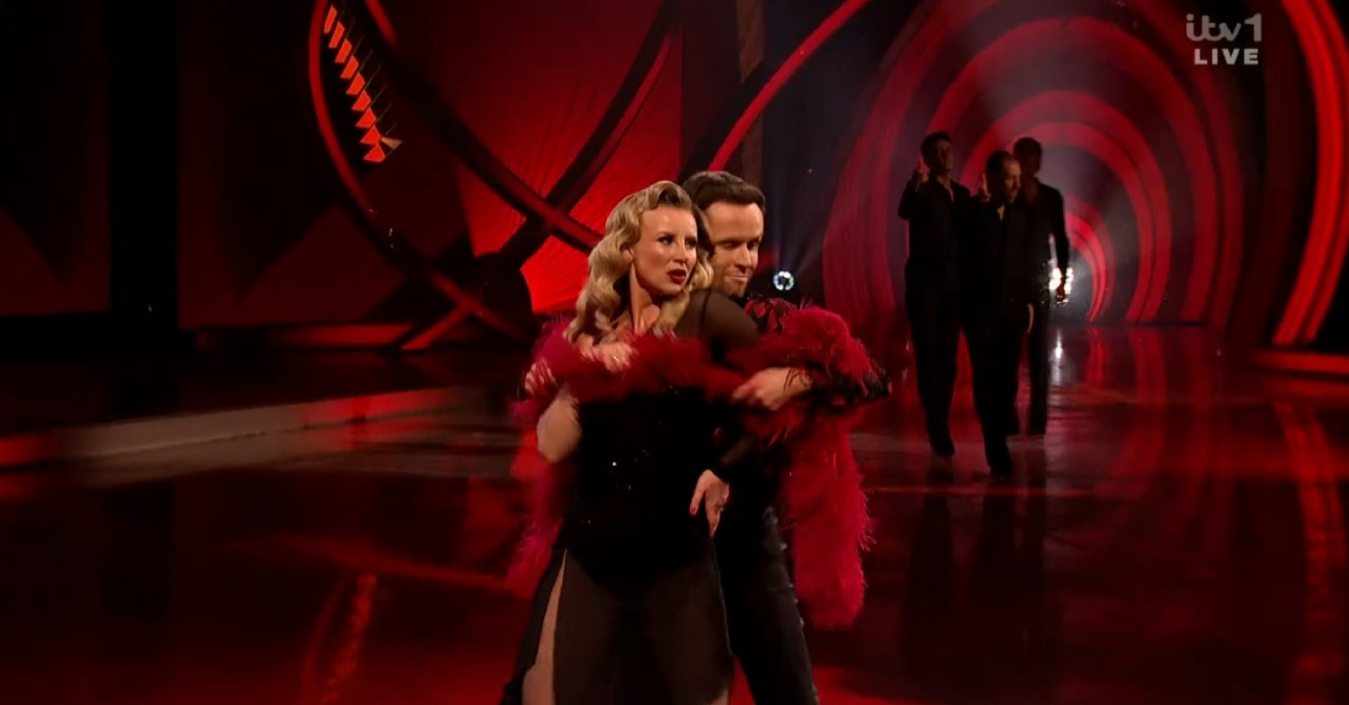 Carley Stenson and Mark Hanretty with a feather boa on Dancing On Ice 