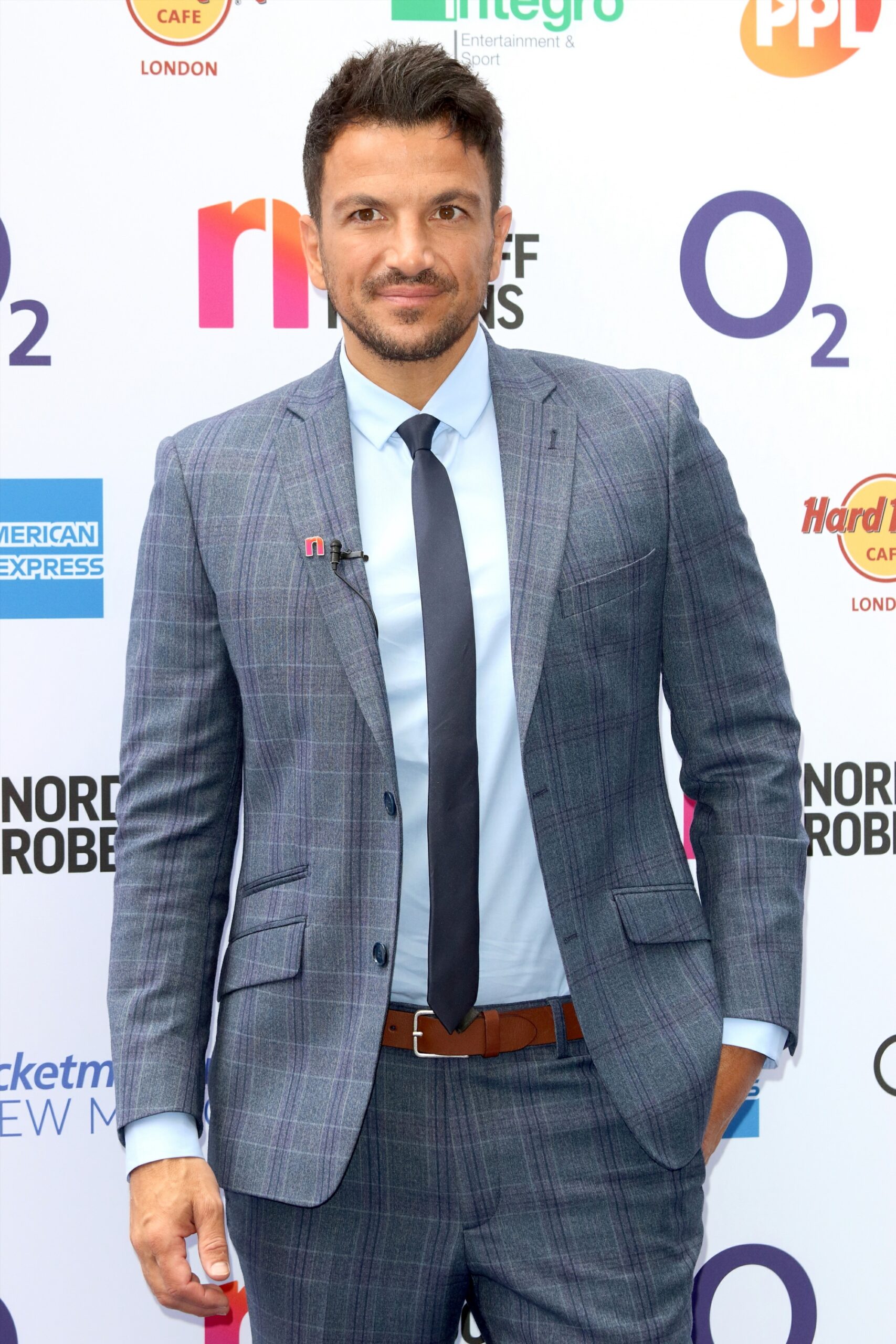 Peter Andre posing in a suit