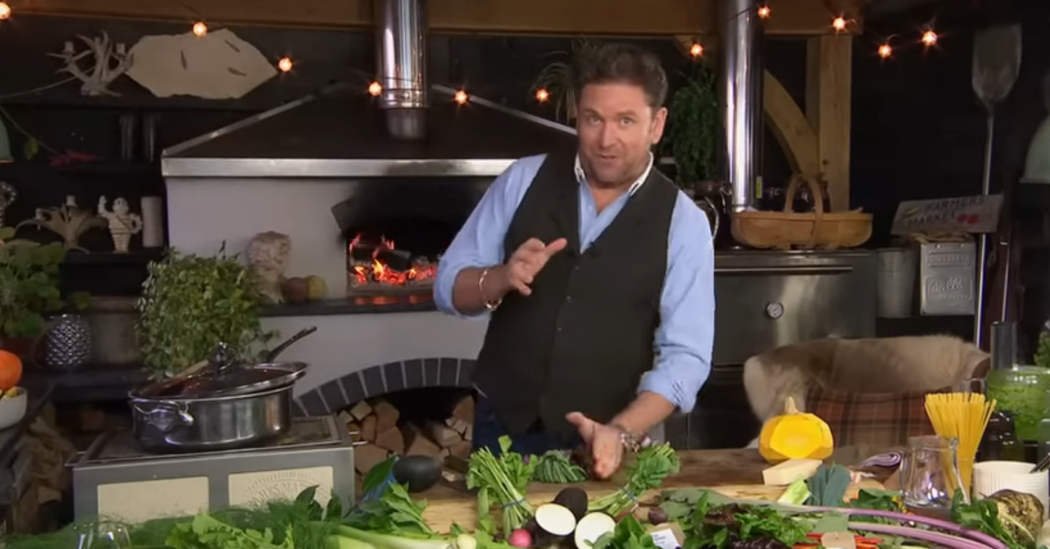 James Martin smiling as he cooks on Saturday Morning