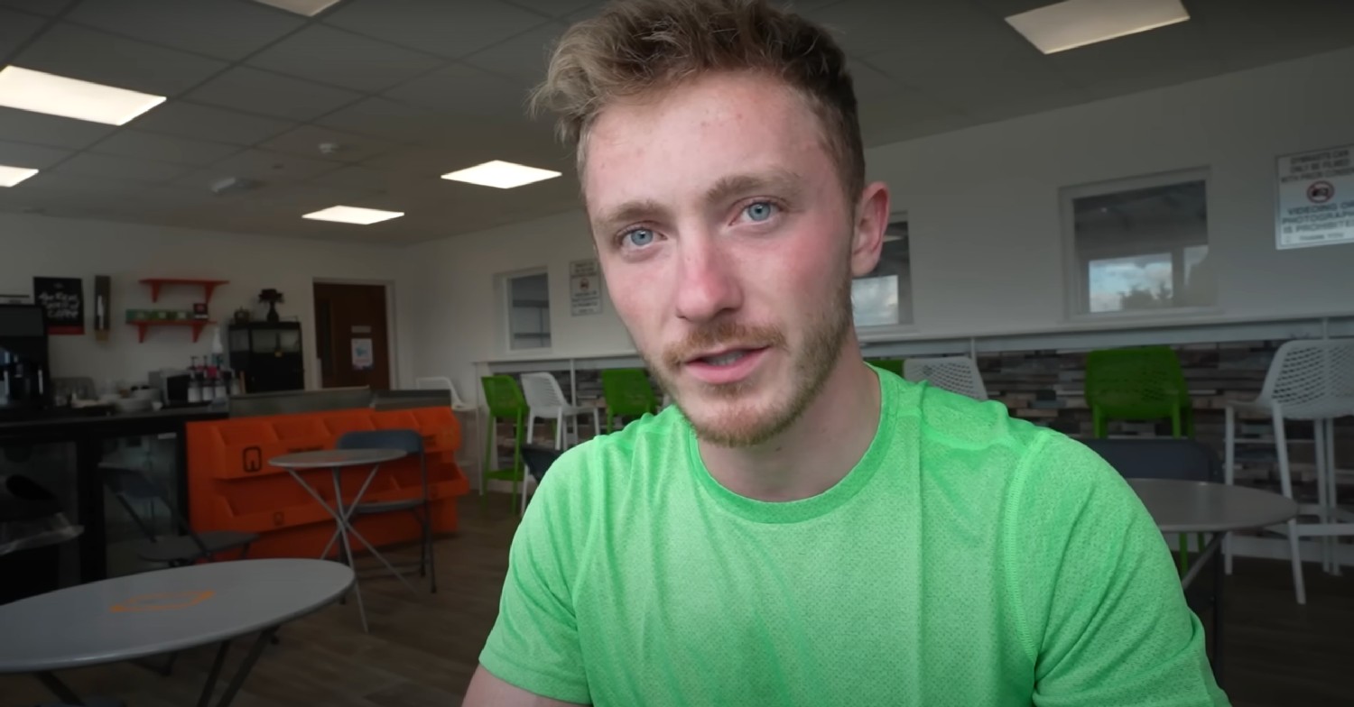 Dancing On Ice star Nile Wilson speaking to camera in a green t-shirt 