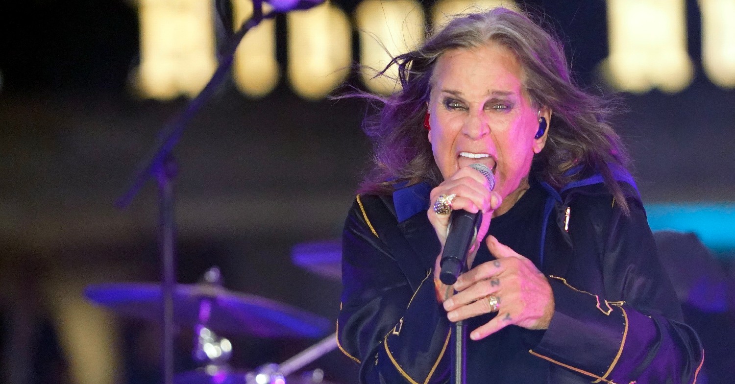 Ozzy Osbourne singing on stage 