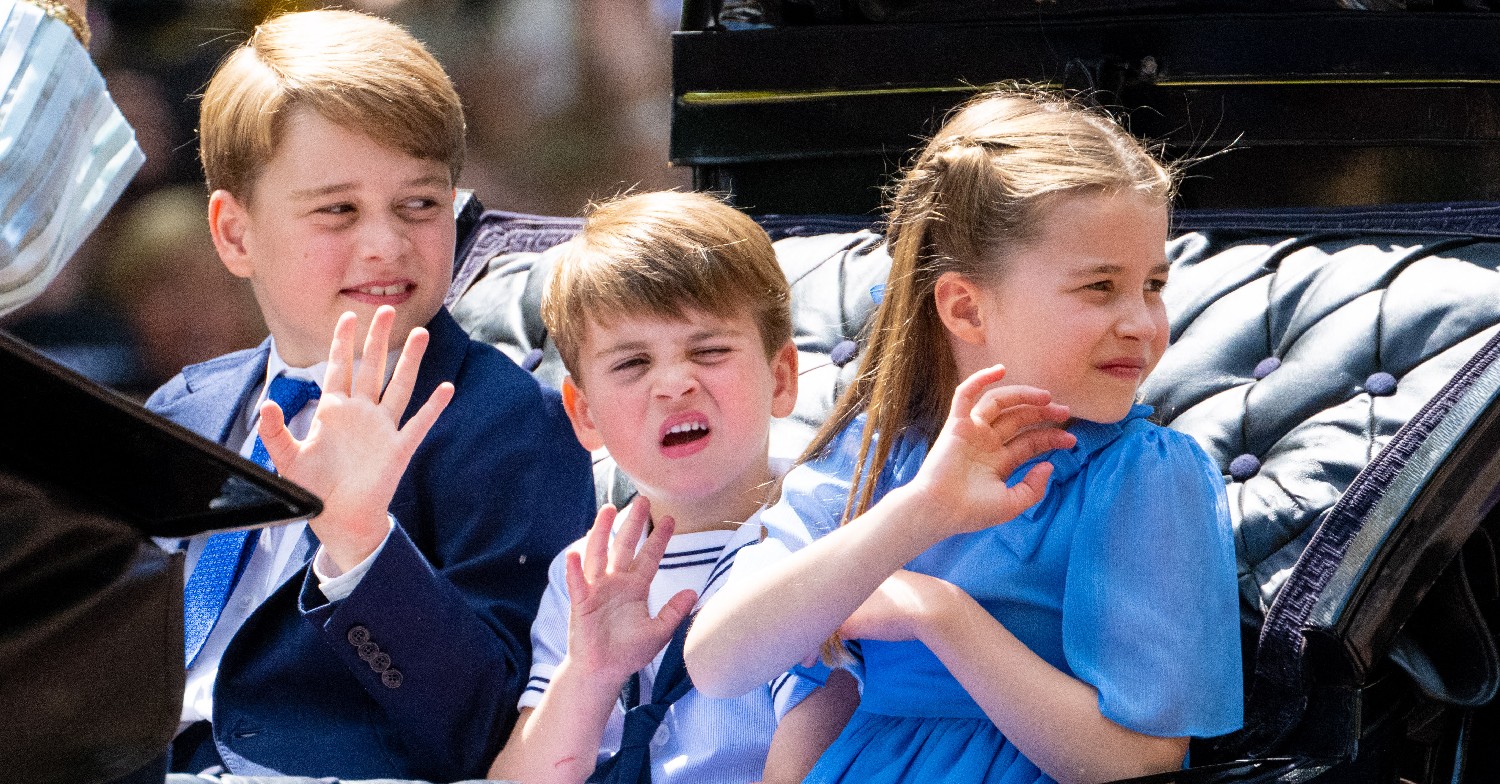 Prince George, Prince Louis, Princess Charlotte waving in a carriage 
