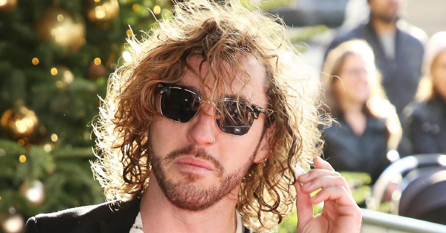 Seann Walsh posing for the camera at an event
