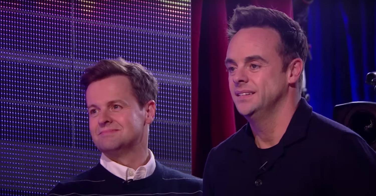 Ant and Dec both smile as they observe