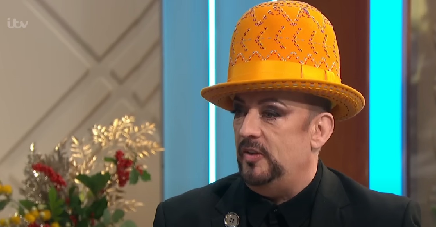 Boy George talking in orange hat on Lorraine