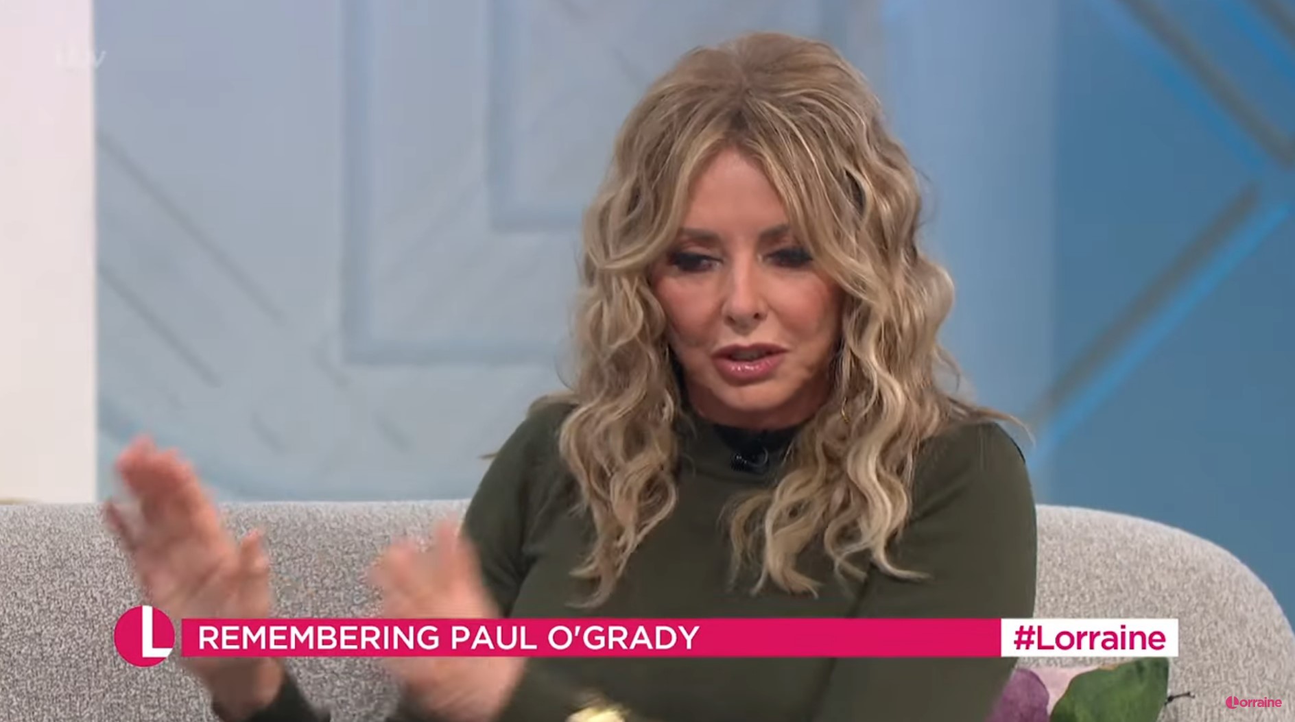 Carol Vorderman looks down as she talks animatedly about Paul O'Grady on Lorraine