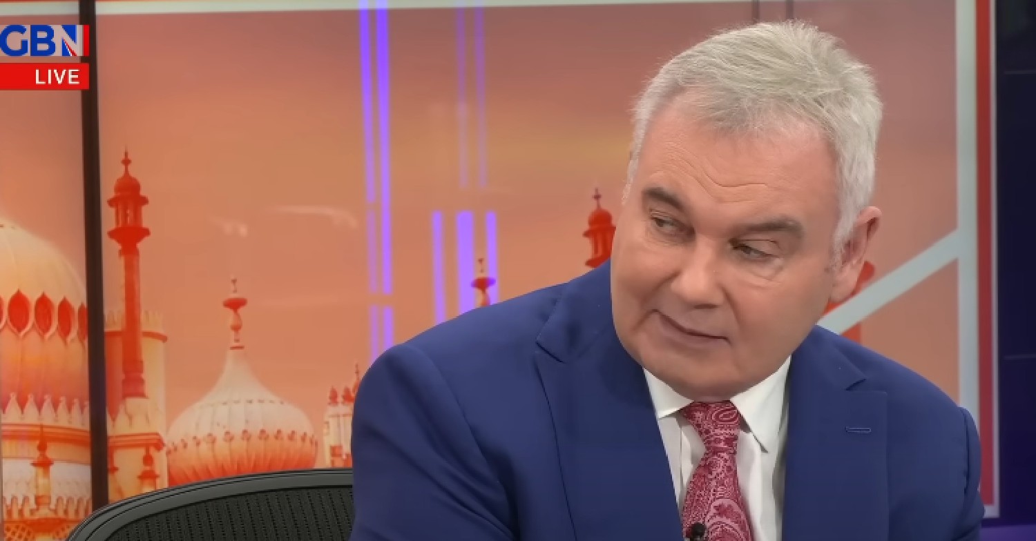 Eamonn Holmes looking to the side on GB News