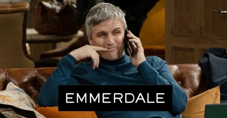 Emmerdale's Caleb on the phone smirking with the logo comp image