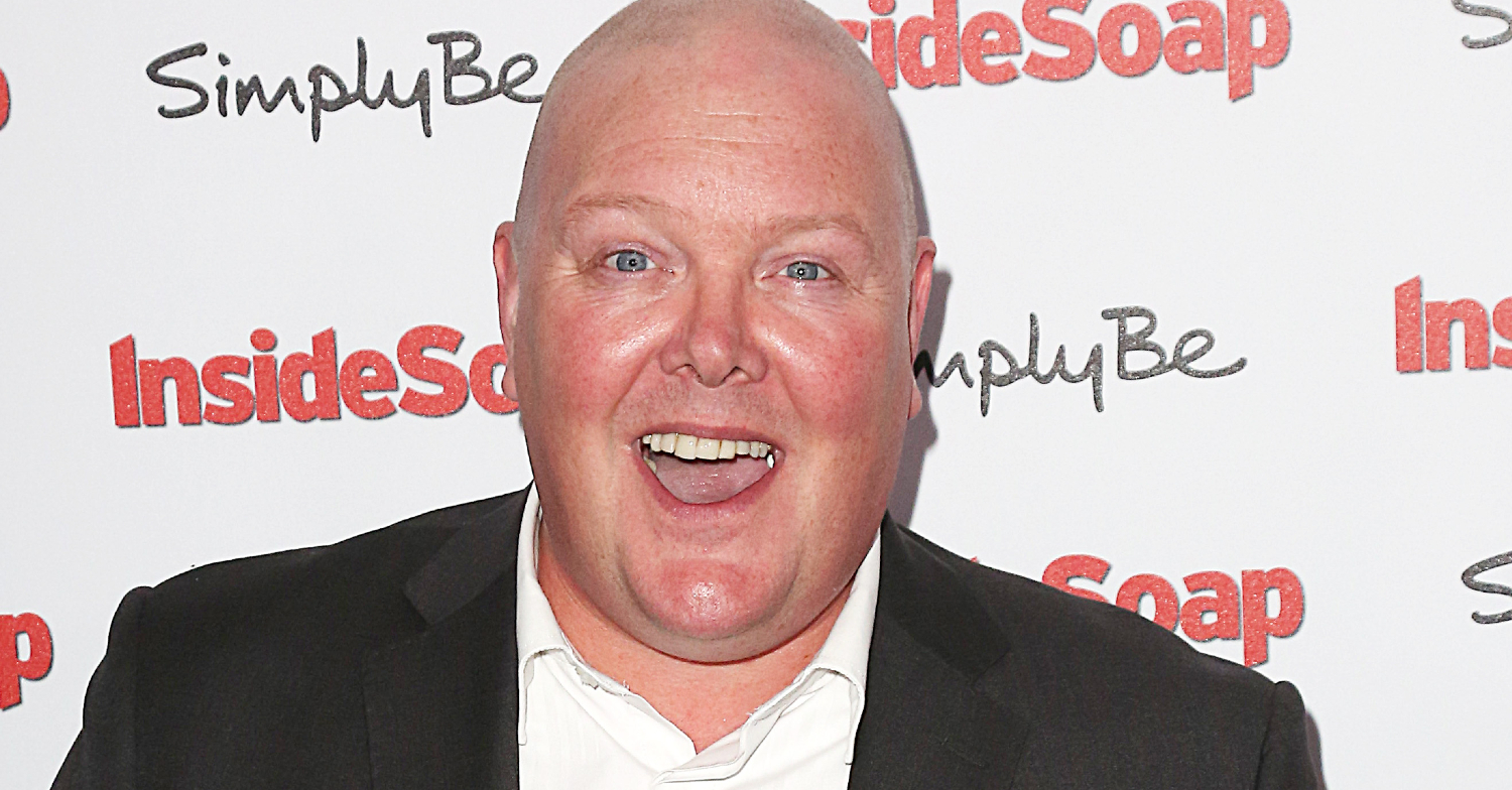 Emmerdale's Dominic Brunt is smiling on the red carpet