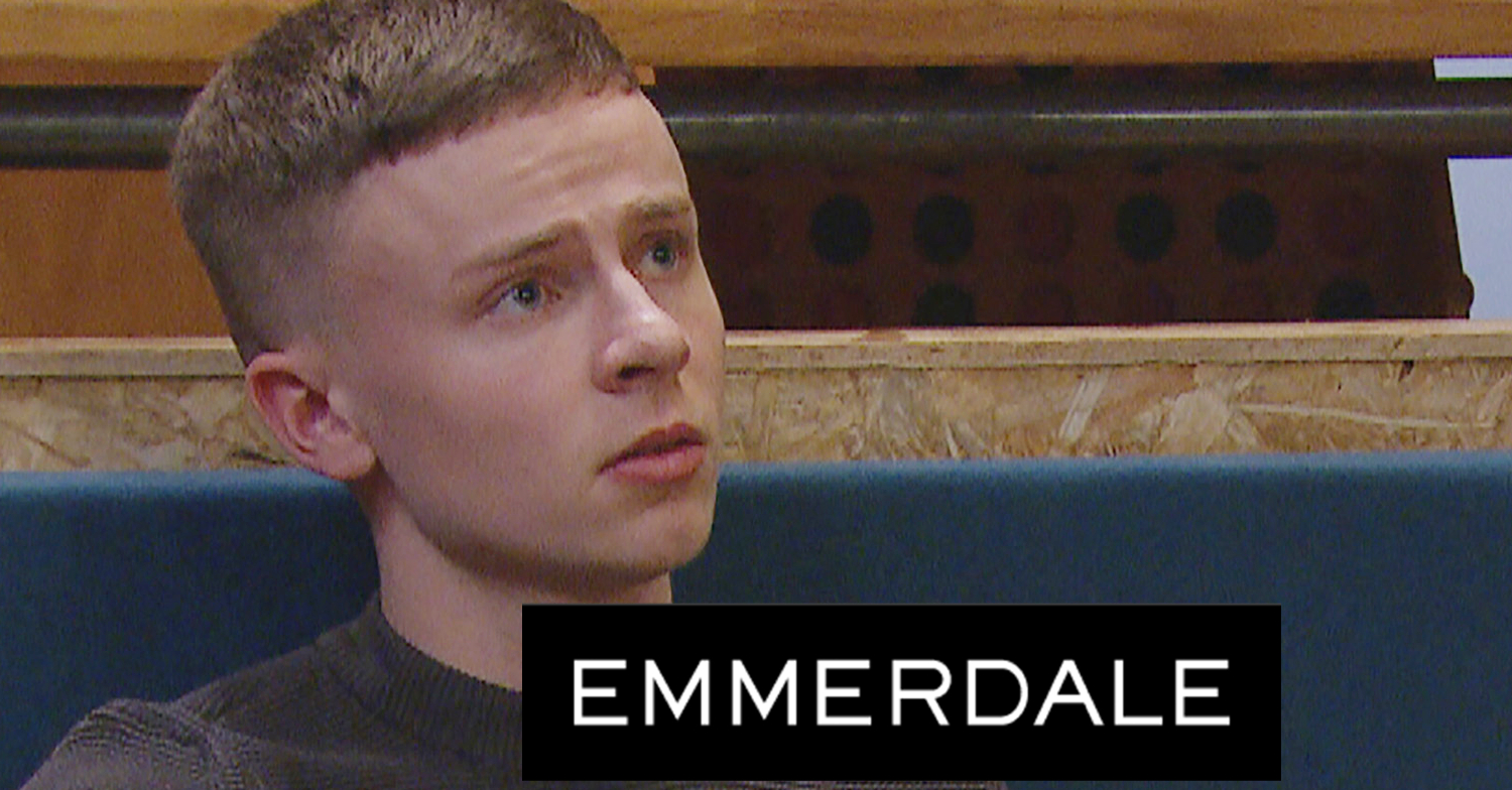 Emmerdale's Samson with the Emmerdale logo