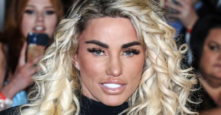 Katie Price with blonde hair smiling