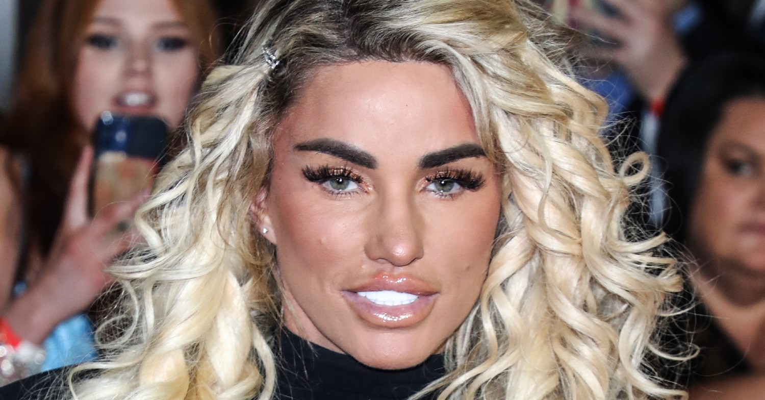 Katie Price with blonde hair smiling