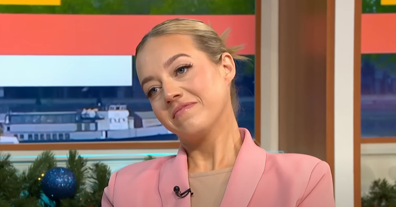 Kelsey Parker tilts her head and smiles on GMB