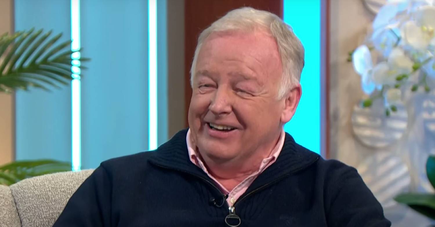 Les Dennis chuckles