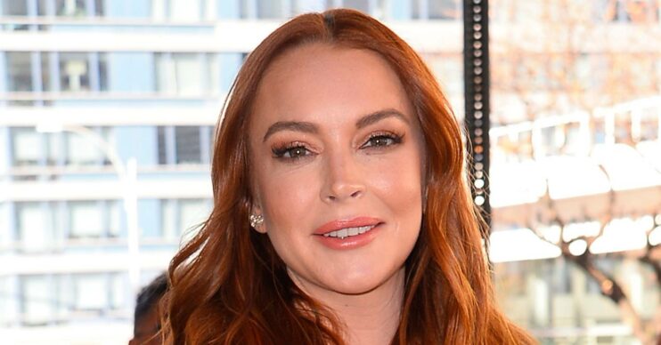 Lindsay Lohan smiles at event