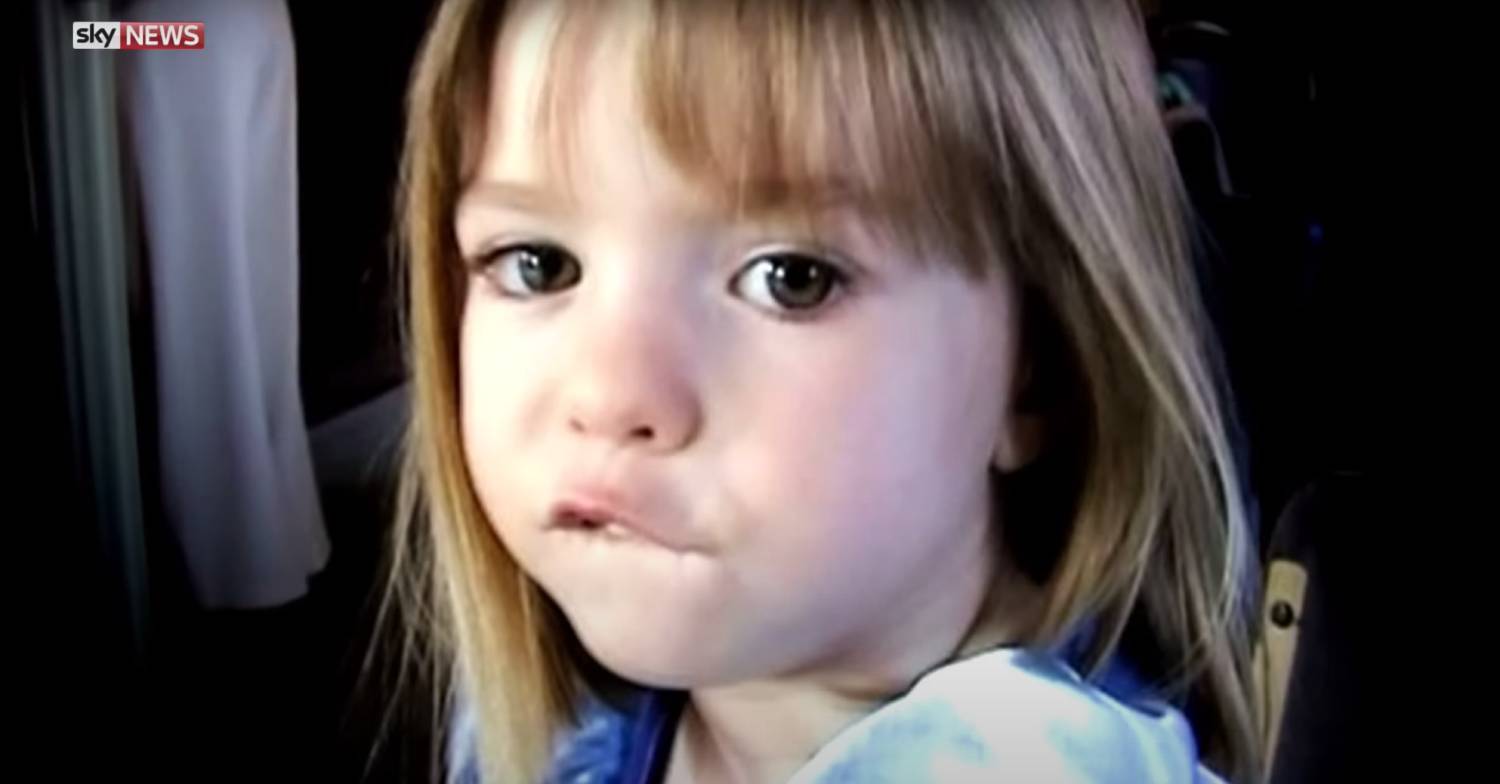 Madeleine McCann looks into a camera