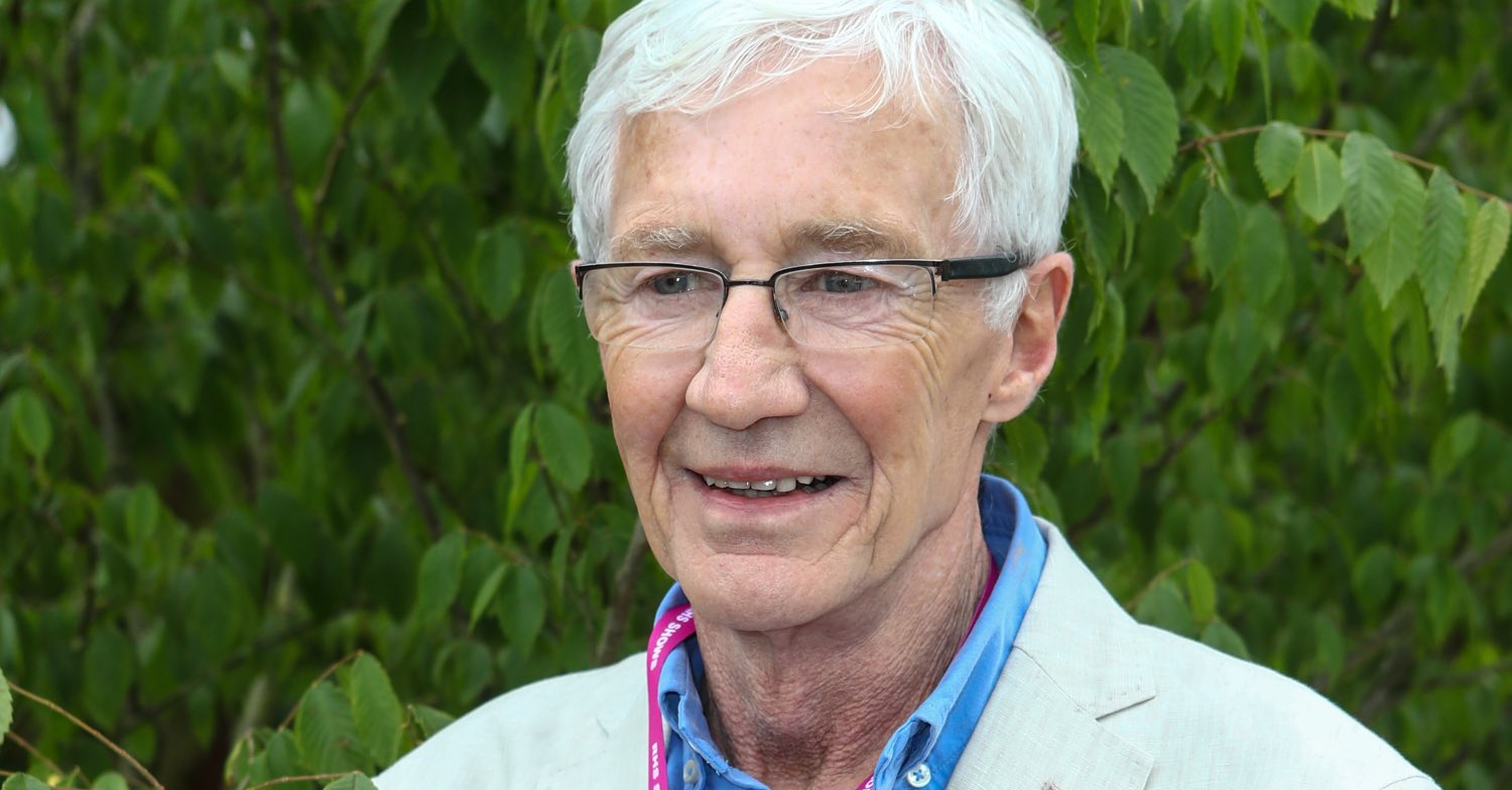 Paul O'Grady smiling at Chelsea Flower Show